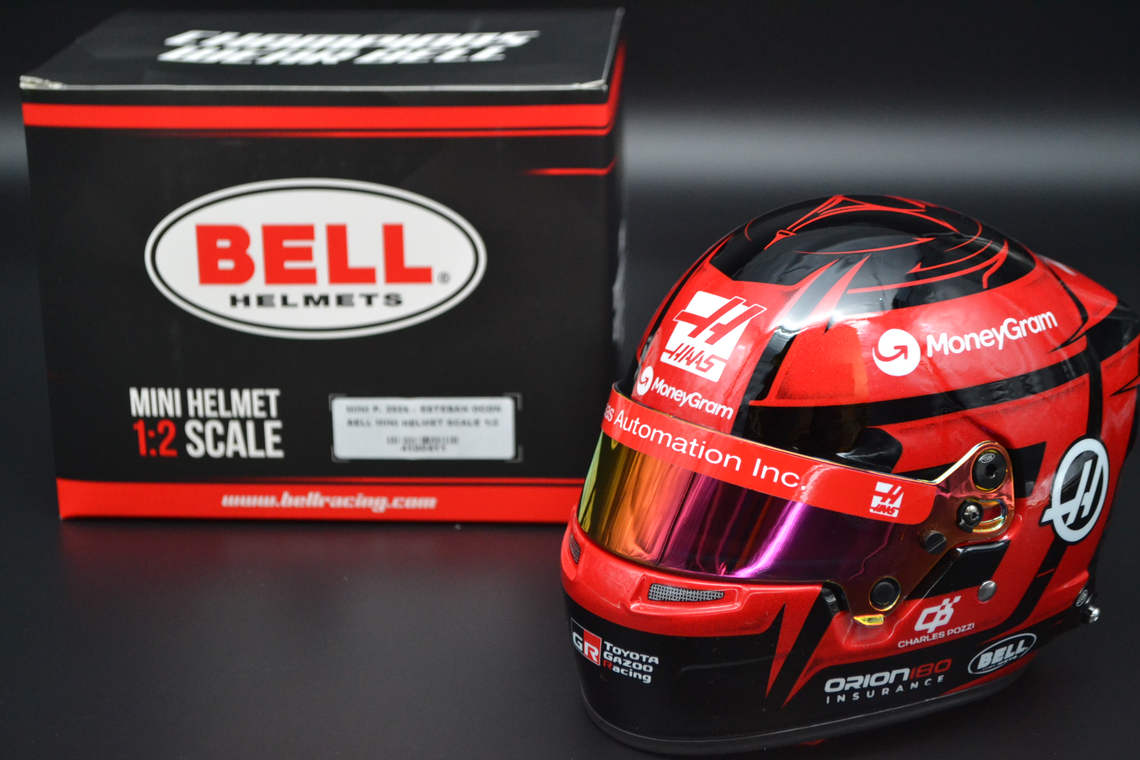 Esteban Ocon HAAS Ferrari MoneyGram mini helmet 2025 season