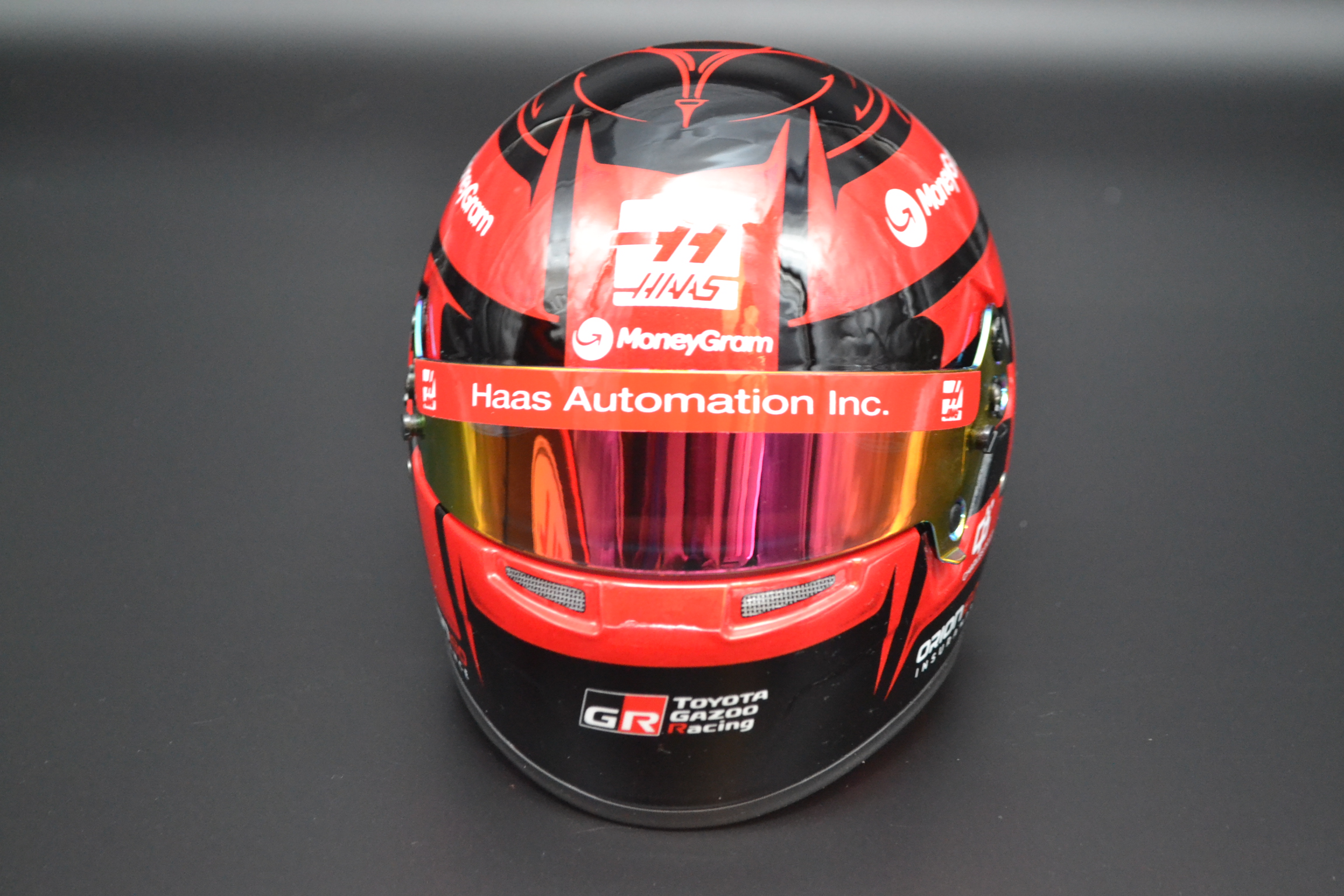 Esteban Ocon HAAS Ferrari MoneyGram mini helmet 2025 season