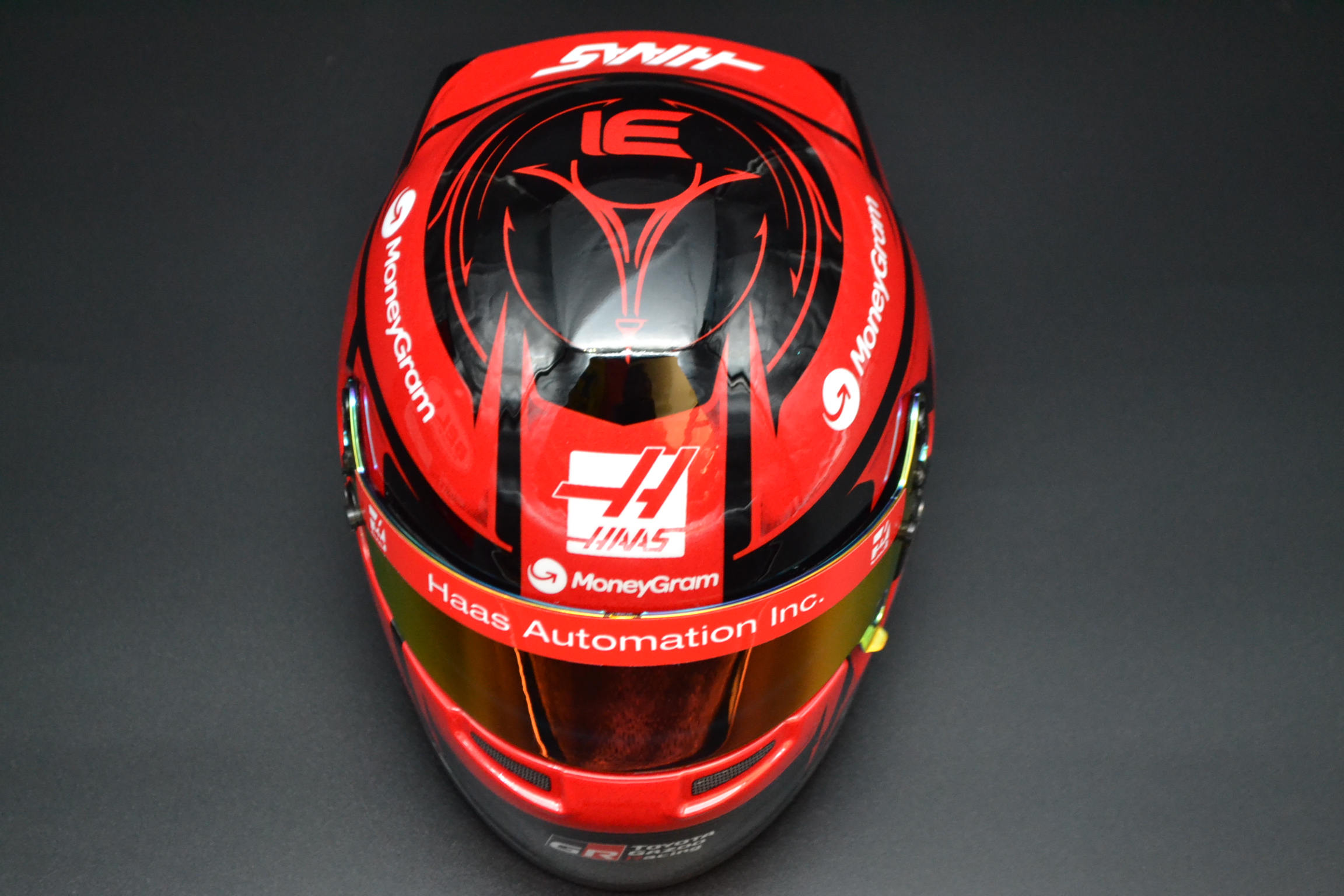 Esteban Ocon HAAS Ferrari MoneyGram mini helmet 2025 season