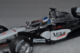 Mika Hakkinen Mc Laren Mercedes MP4-14 race car World Champion 1999 season