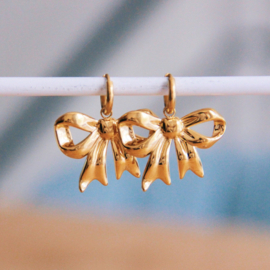 Stainless steel hoop earrings met strik - gold