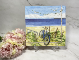 Ambiente fiets op strand  servet nr H417
