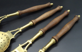 Set of brass kitchen utensils