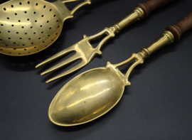 Set of brass kitchen utensils