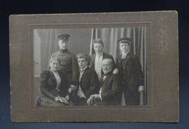 Studio photograph, German soldier with family