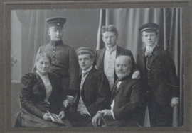 Studio photograph, German soldier with family