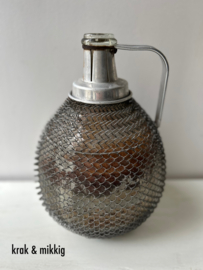 Oude Franse vintage fles met gaas