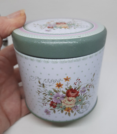 Voorraad blikje rond bloemen (nieuw)