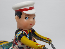 Blikken mannetje op de fiets