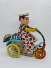 Blikken mannetje op de fiets