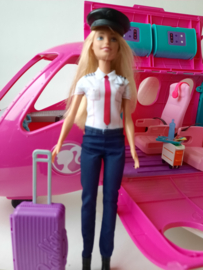 Barbie vliegtuig met piloot en enkele accessoires