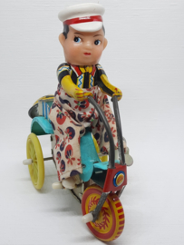 Blikken mannetje op de fiets