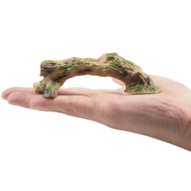 Jaguar (vrouwtje) op boomstam  Toymany