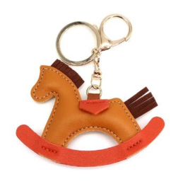 Leren sleutelhanger hobbelpaard oranje