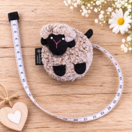 Rol centimeter wollig schaap