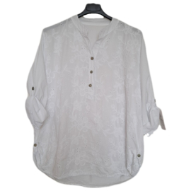witte blouse
