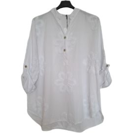 witte blouse
