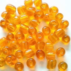 Glas rocaille 4mm (6.0) Transparant Oranje - Per zakje ca 55 stuks