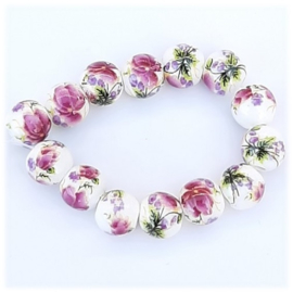 Keramiek kralen 6 of 8mm met roze bloem