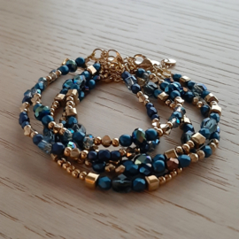 Armband Blauwe Glaskralen en Goudkleur Hematiet