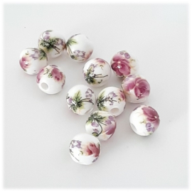 Keramiek kralen 6 of 8mm met roze bloem